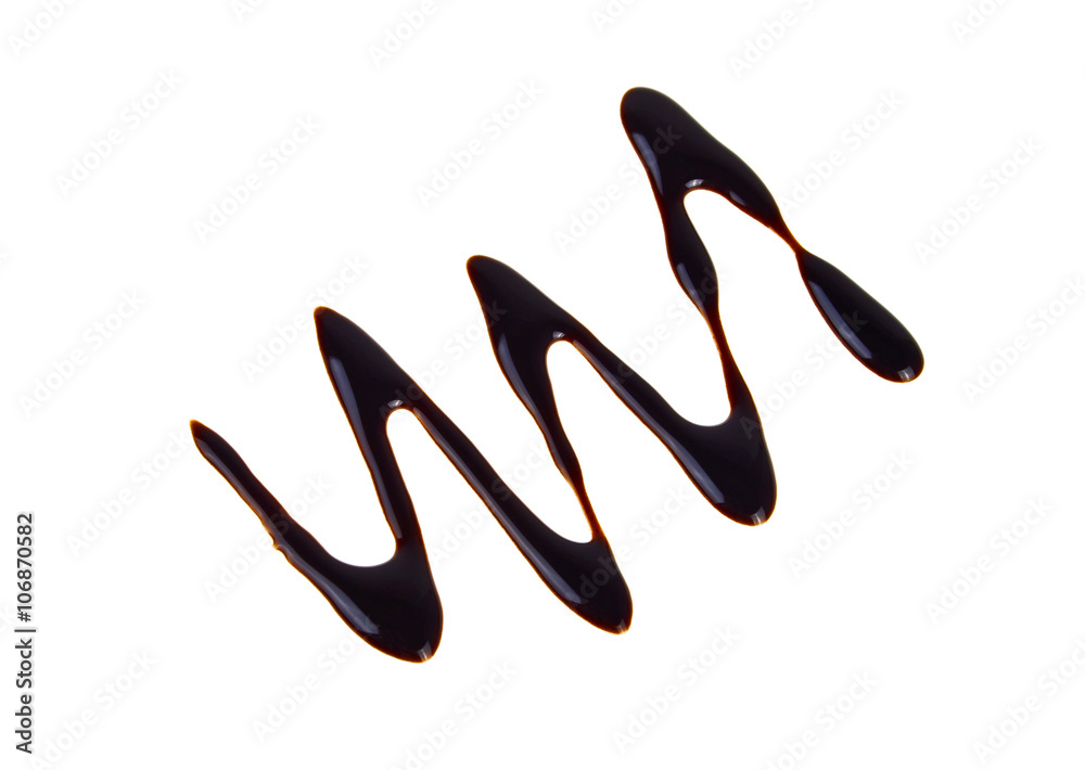 Liquid dark chocolate isolated on white background, silhouette o Liquid dark chocolate isolated on white background, silhouette o