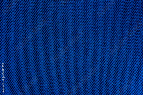 Blue fishnet cloth material as a texture background. 