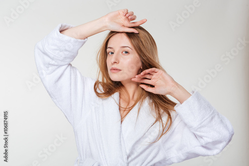 Beauty portrait of a young woman in bathrobe