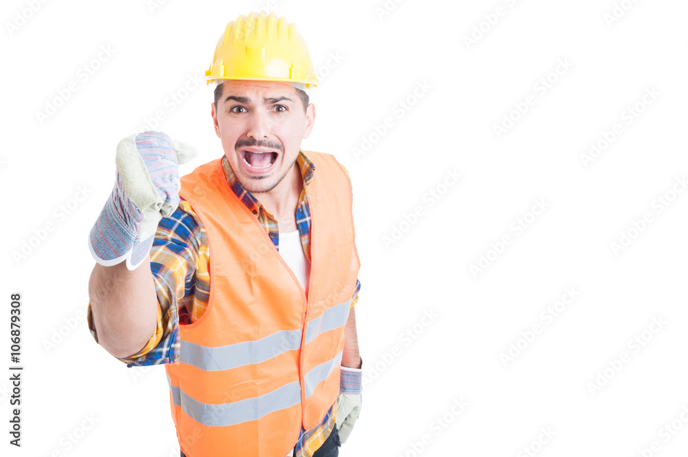 Stressed constructor yelling and standing with fist up Stressed constructor yelling and standing with fist up