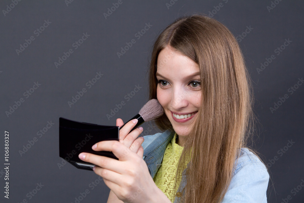 beautiful girl apply makeup to the face beautiful girl apply makeup to the face
