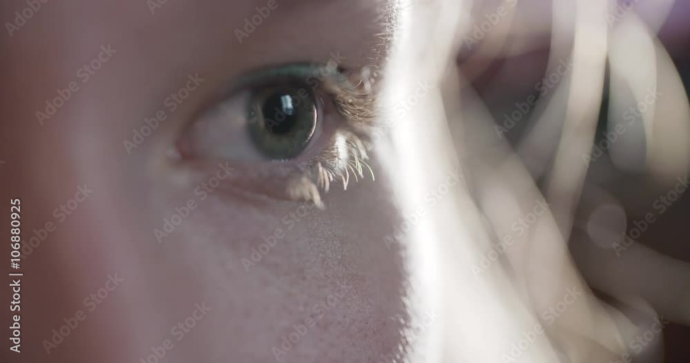 macro closeup footage of female teen green eye, 4k mprores footage shot in 60fps