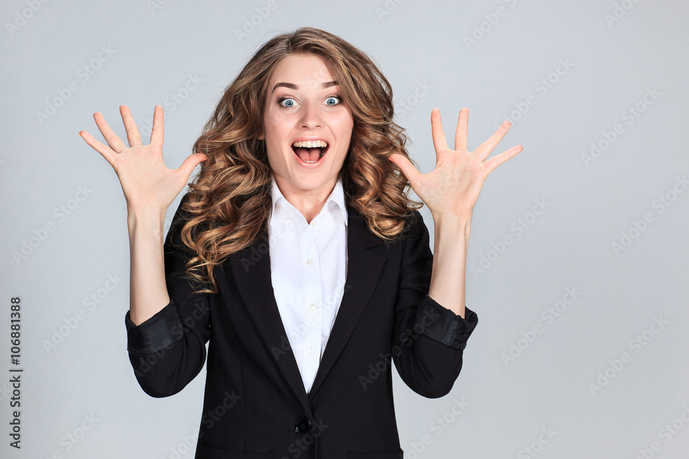 The young woman's portrait with happy emotions The young woman's portrait with happy emotions