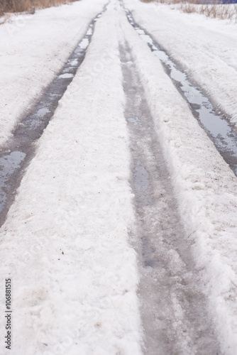 spring road with snow © rufar