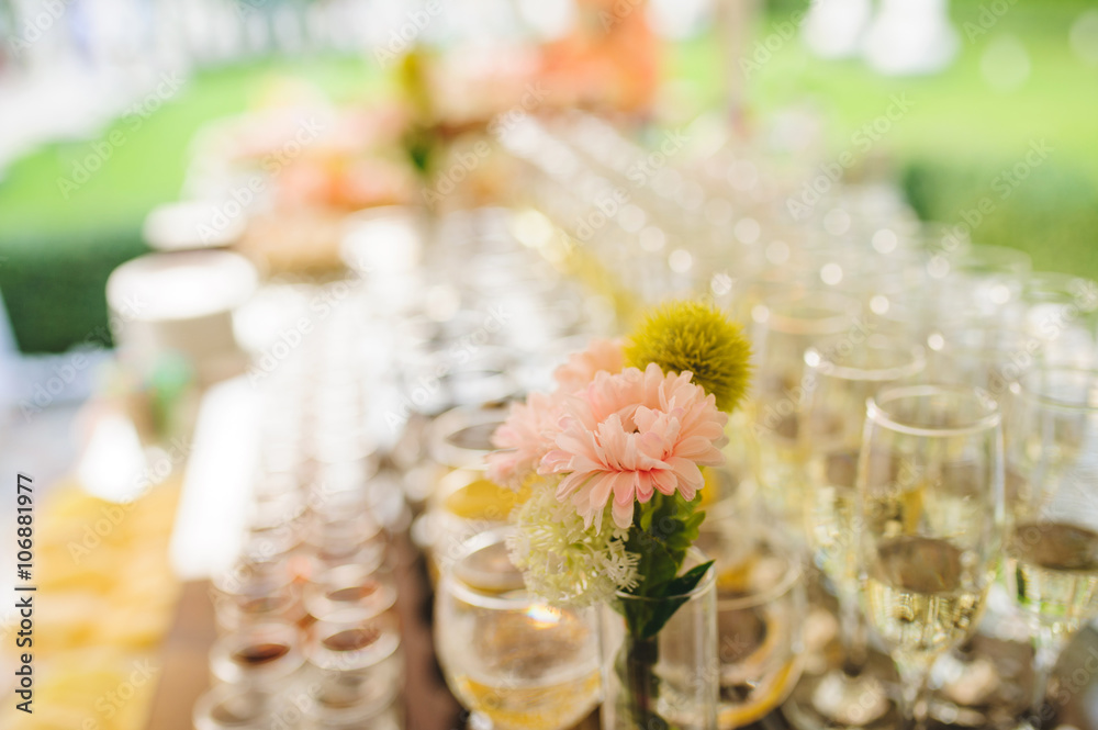 Flowers on Table with Glasses