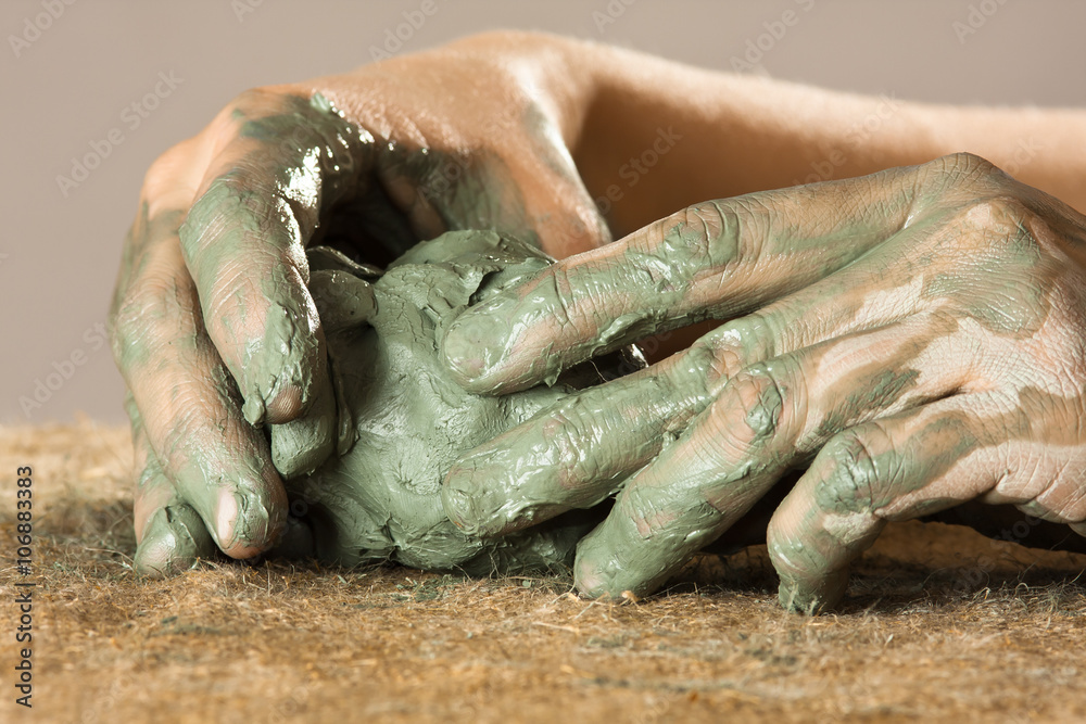 hands working with clay, closeup