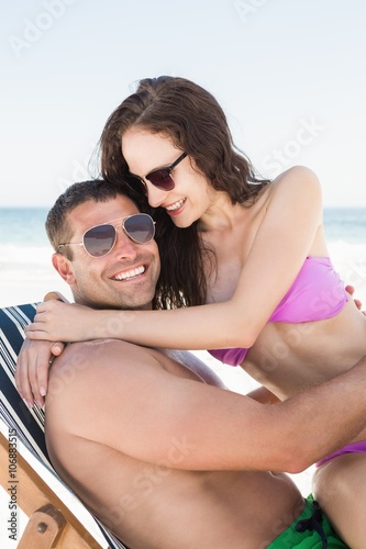 Girlfriend sitting on boyfriend lap © WavebreakMediaMicro