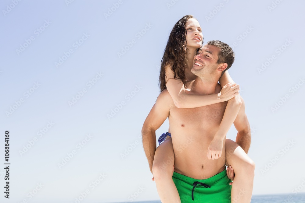 Boyfriend giving piggy back to girlfriend Boyfriend giving piggy back to girlfriend