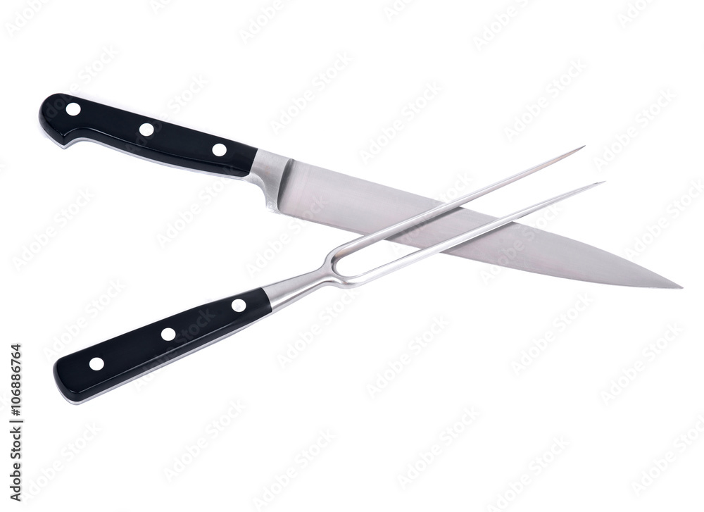 Carving knife and fork separated on white background Carving knife and fork separated on white background