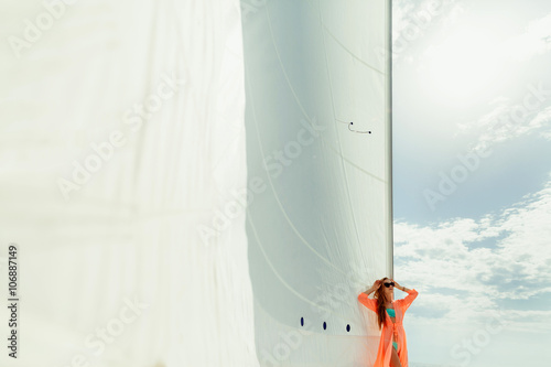 woman yachting white sails luxury sailboat travel