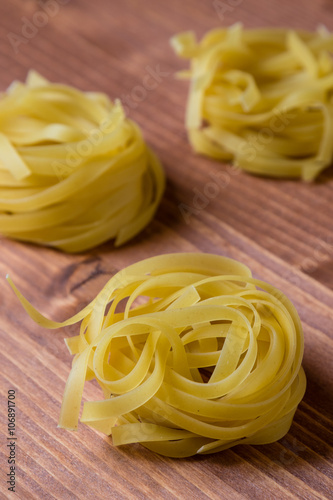 tagliatelle pasta on brown table