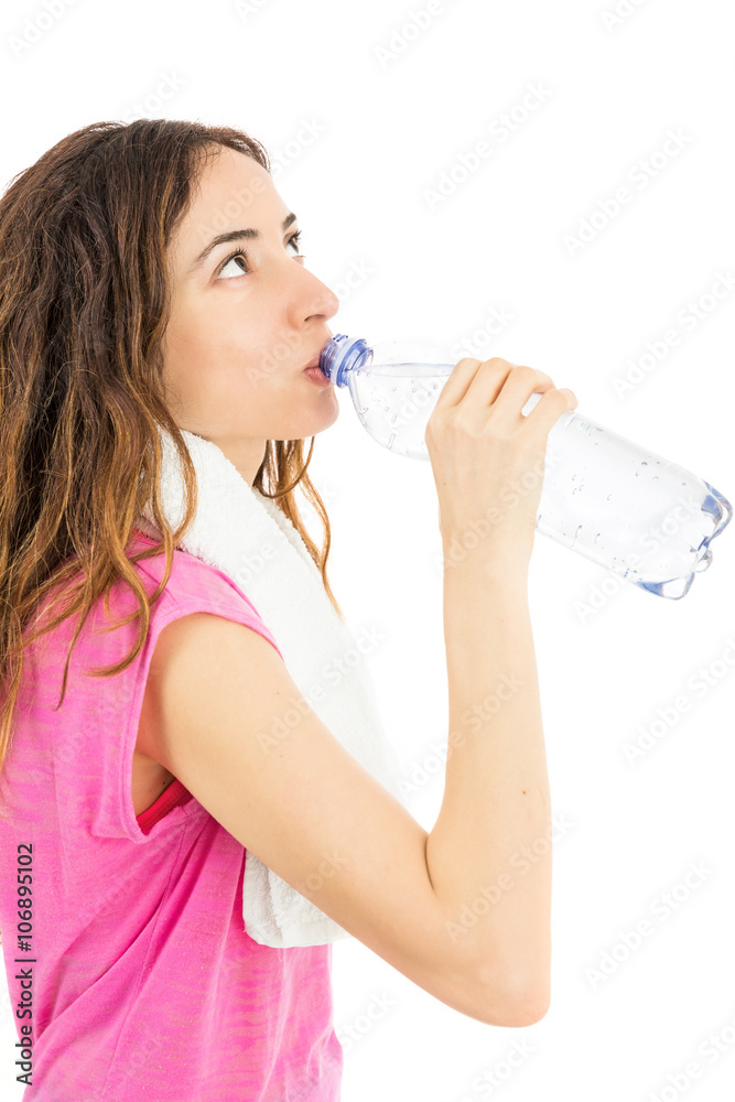 Fitness woman drinking water during sportss Fitness woman drinking water during sportss