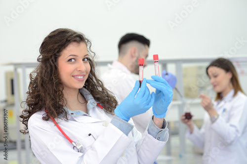 beautiful student with test tube