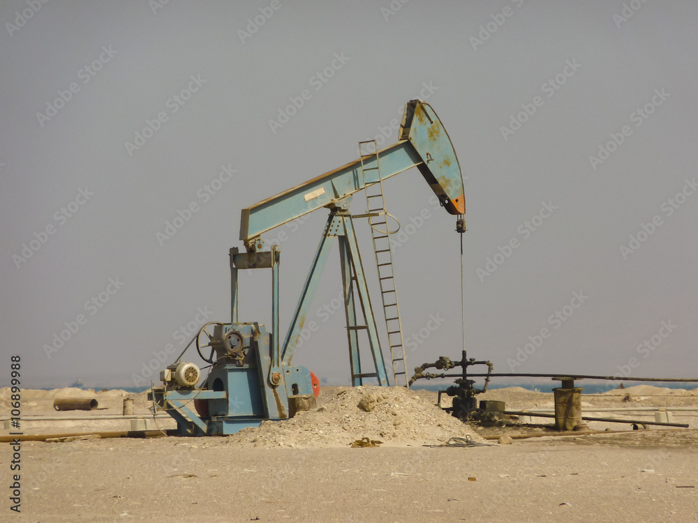 Fototapeta premium Oil Beam Pump or Nodding Donkey on the Beach in Egypt