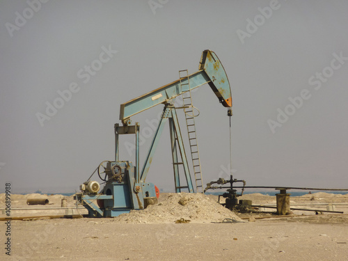 Oil Beam Pump or Nodding Donkey on the Beach in Egypt