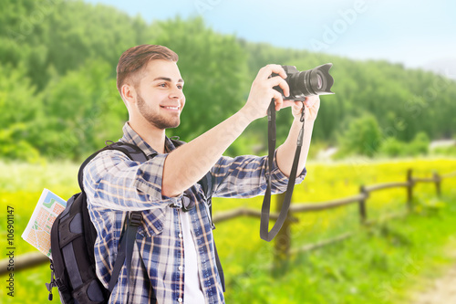 Traveler with camera outside