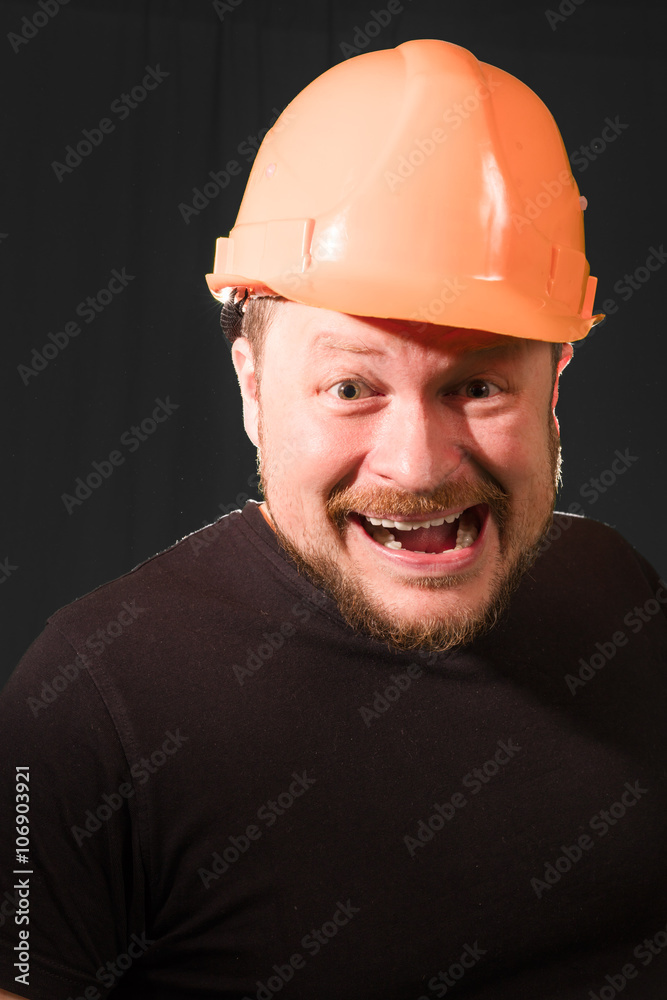 Worker in safety helmet emotional portrait Worker in safety helmet emotional portrait