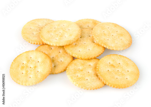 Golden crackers over white background