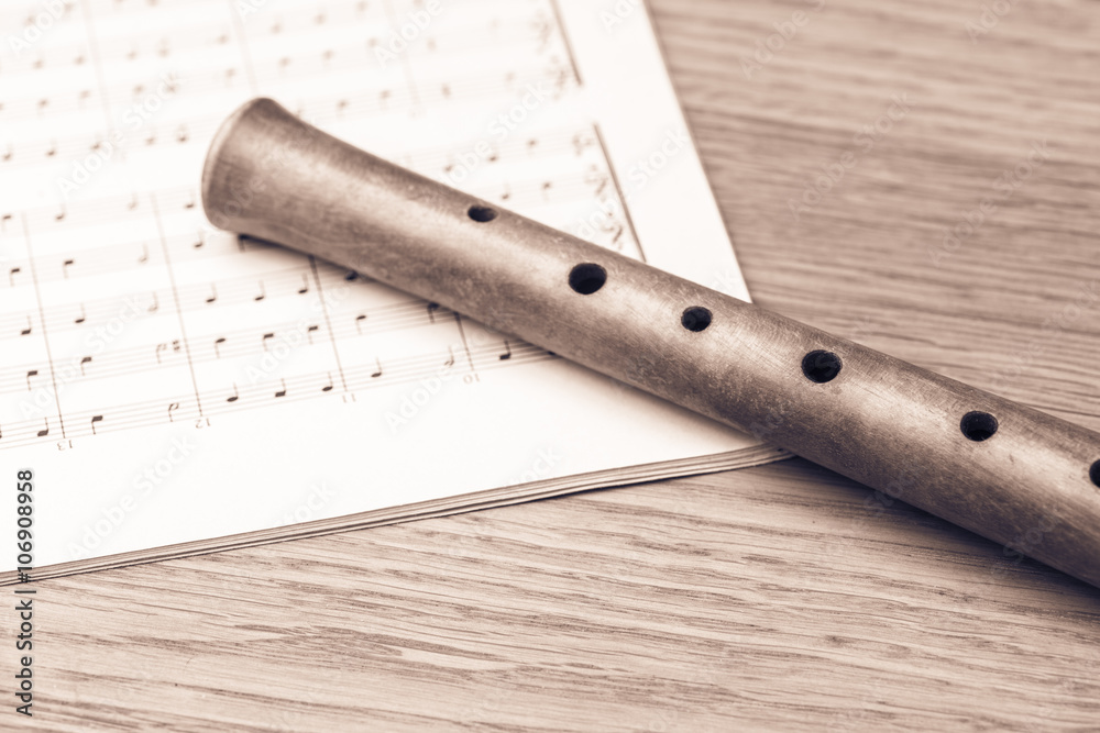 Fototapeta premium Wooden recorder and notes