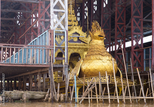 The Royal Karaweik Barge at Phaung Daw Oo pagoda in Inle Lake, Shan State, Myanmar photo