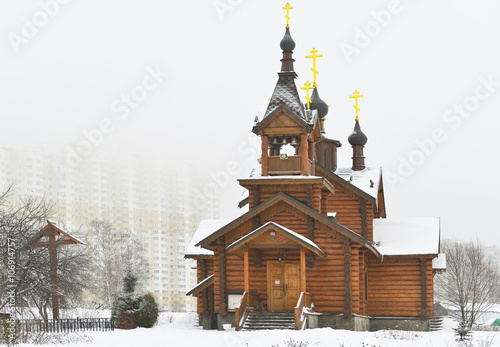 Wooden church of the Holy Apostles Constantine and Elena (Moscow) in the fog photo