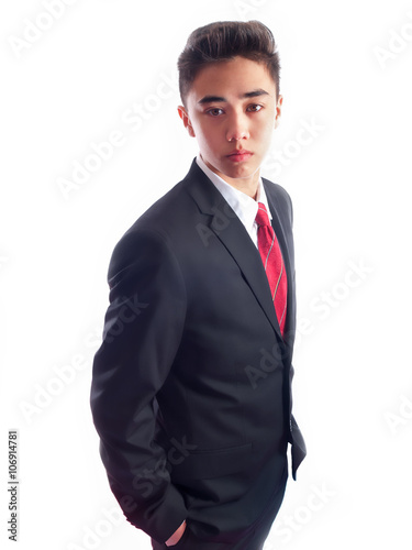 teenage boy wearing a suit