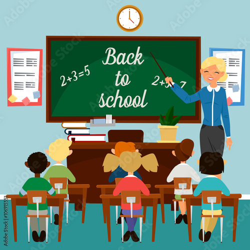 Back to School. Classroom with children. Teacher at the Blackboard