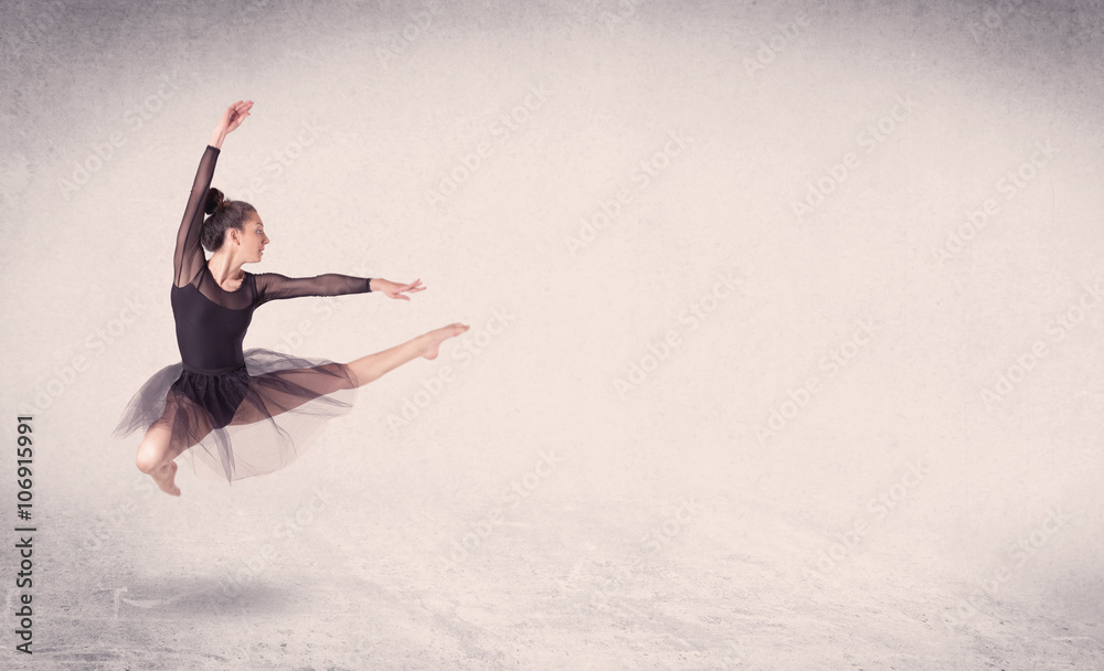 Obraz premium Modern ballet dancer performing art jump with empty background