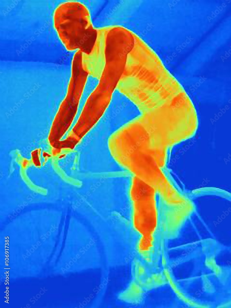 Side view thermal image of young male athlete in training, showing the