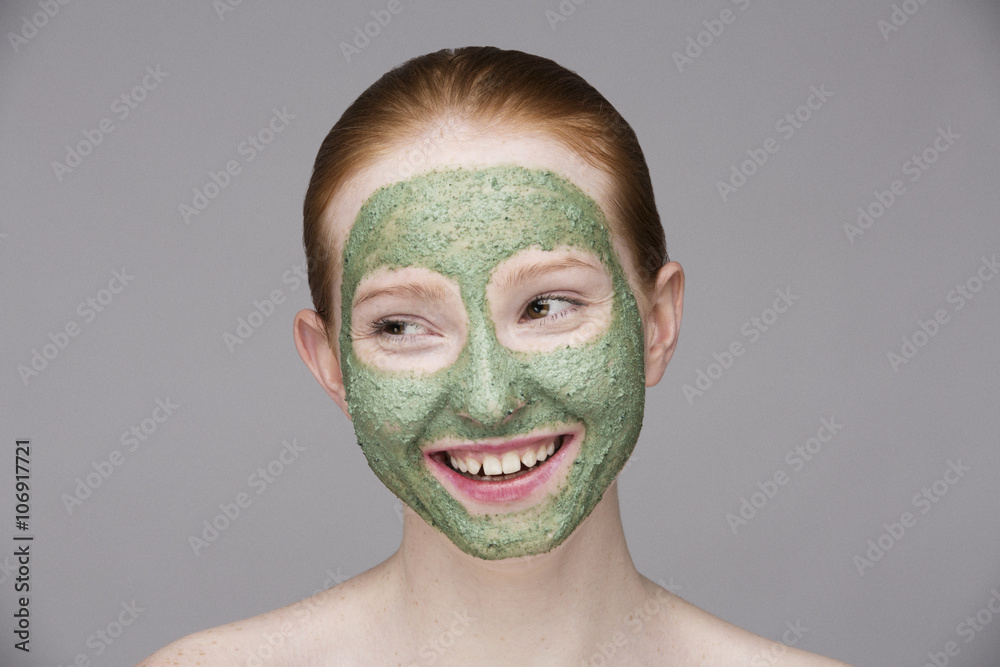 Young woman wearing face mask, smiling Young woman wearing face mask, smiling