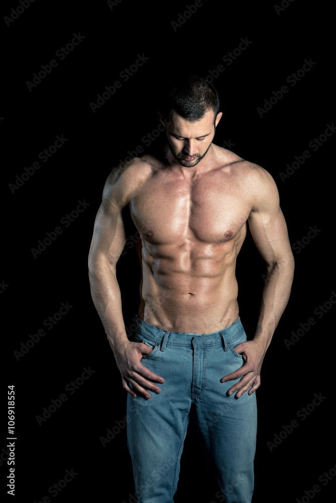 Man posing in jeans