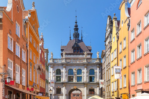 Beautiful historic houses and Golden Gate on Long Lane in Gdansk Old Town in the sunny morning, Poland