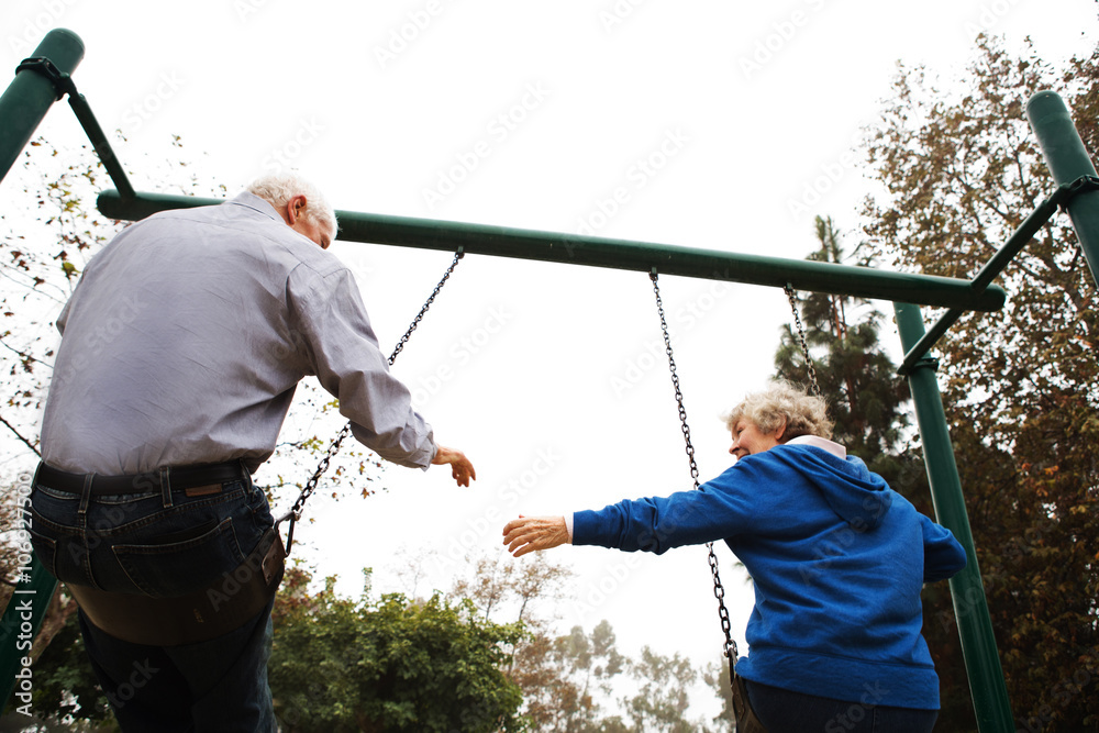 Husband and wife on swing Husband and wife on swing