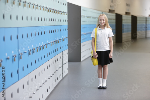 Portrait of schoolgirl in corridor photo