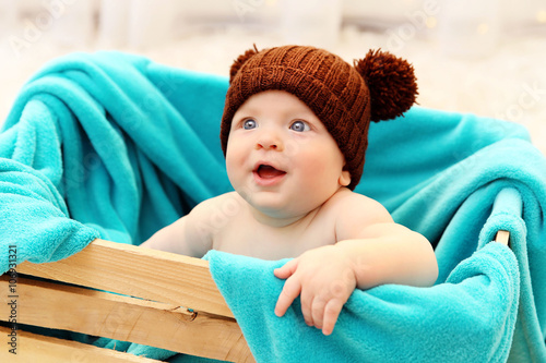Adorable baby in brown knit...