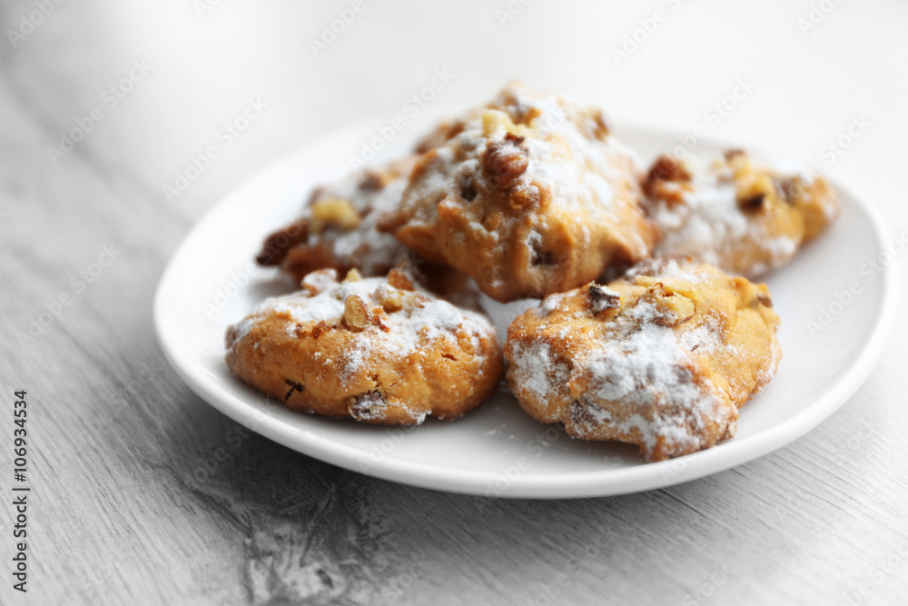 Plate of nut biscuits on wooden background, closeup Plate of nut biscuits on wooden background, closeup