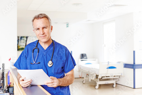 Doctor holding notes photo