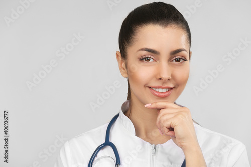 Young female doctor with ha...