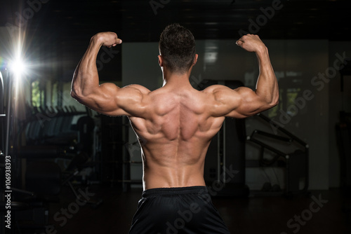 Physically Man Showing His Well Trained Back