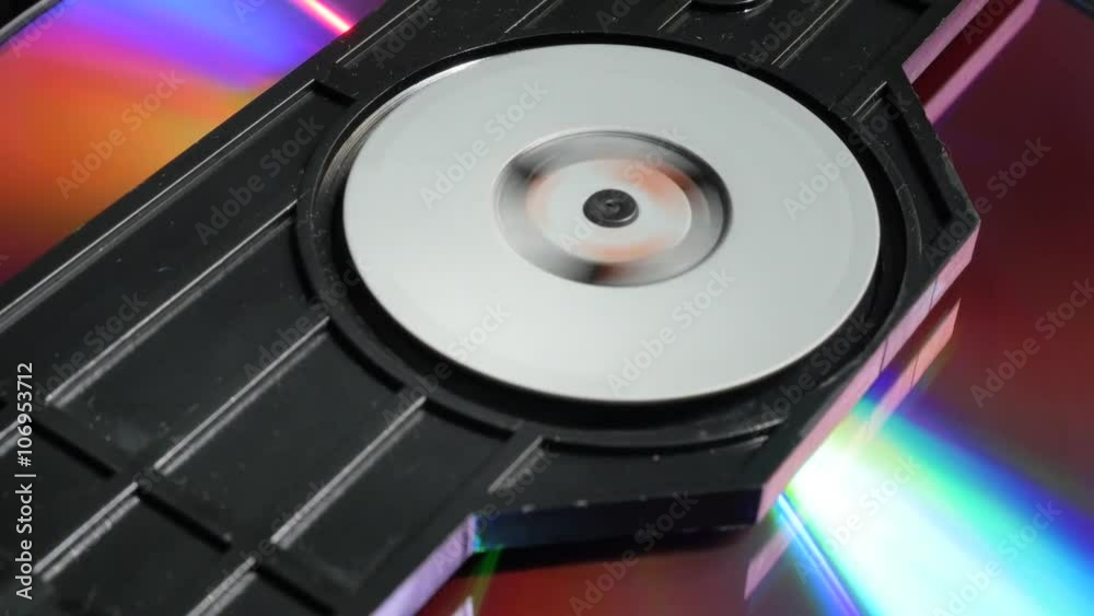 Compact disc medium inserting in player mechanism 4K 2160p UltraHD footage - DVD disk in medium player 4K 3840X2160 UHD video Compact disc medium inserting in player mechanism 4K 2160p UltraHD footage - DVD disk in medium player 4K 3840X2160 UHD video