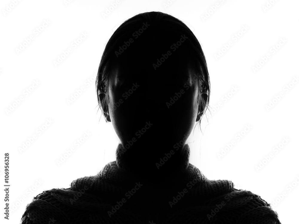 Hidden face in the shadow.Female silhouette. Stock Photo