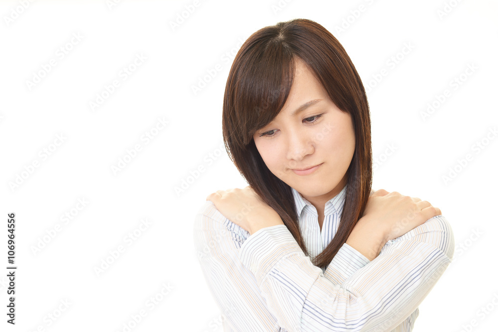 肩こりに悩む女性 肩こりに悩む女性