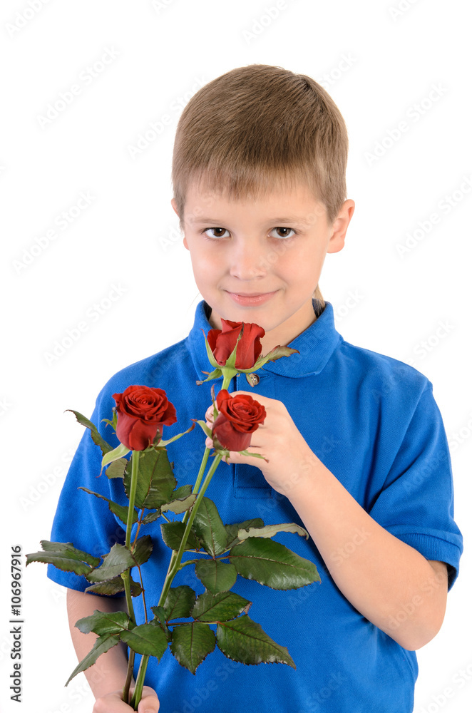Young boy smelling a rose isolated on white background Young boy smelling a rose isolated on white background