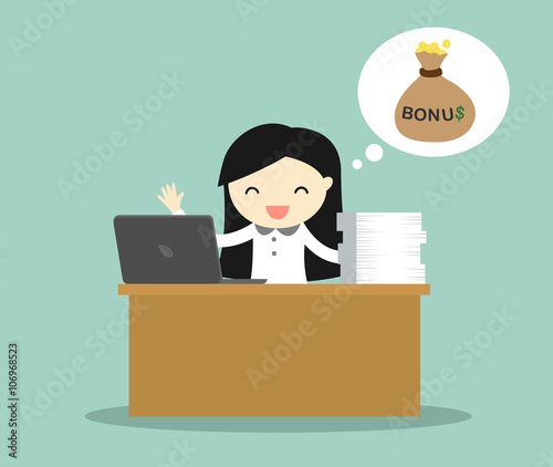 Business concept, Business woman working on her desk and thinking about bonus. 