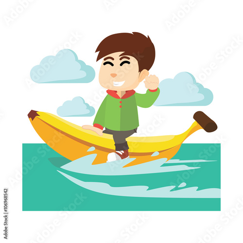 Boy ridding banana boat