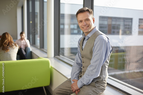 Portrait of mature man wearing waistcoat photo