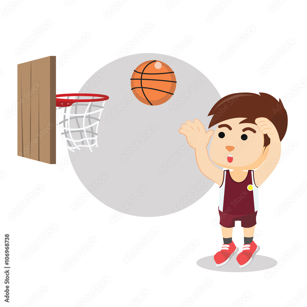 Boy shooting basket ball