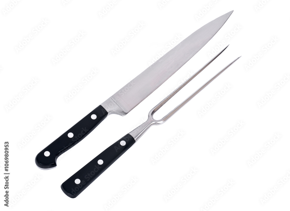 Carving knife and fork separated on white background Carving knife and fork separated on white background
