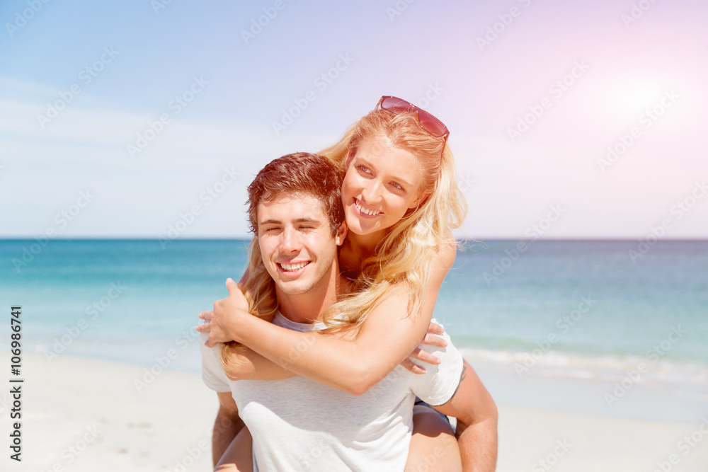 Portrait of man carrying girlfriend on his back Portrait of man carrying girlfriend on his back