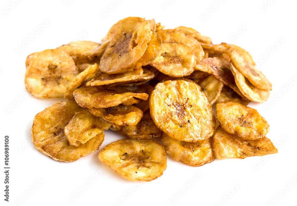 Banana crisp on white background.Food processing Banana crisp on white background.Food processing